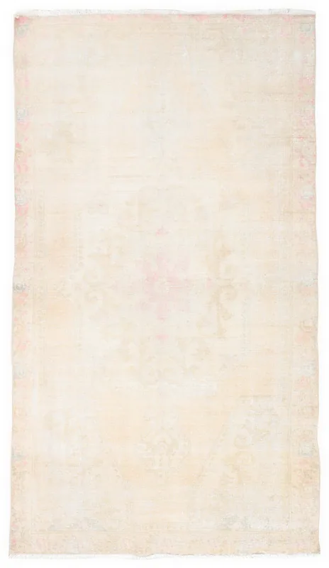 Full overhead view of the ivory and rose vintage Anatolian rug