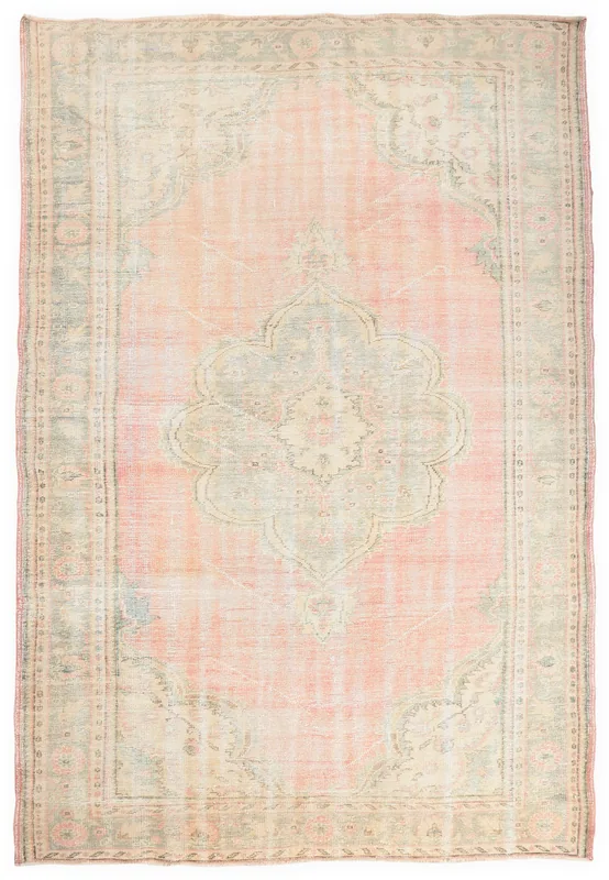 Full top view of a large vintage Anatolian rug with a rose field and central medallion on a white background.