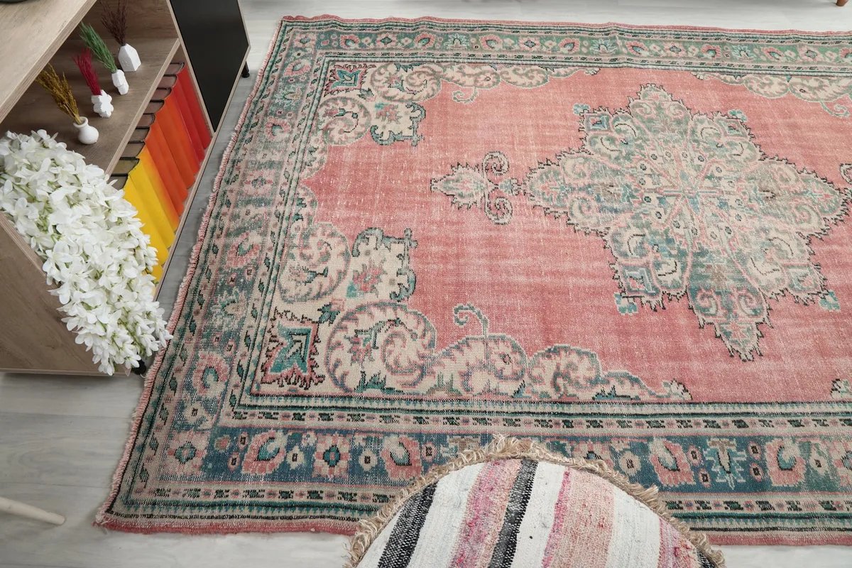 Angled view of the rug from the side, showing the full length and design