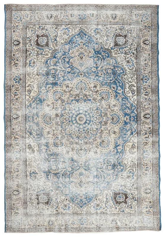 Full overhead view of the blue and beige vintage Anatolian area rug