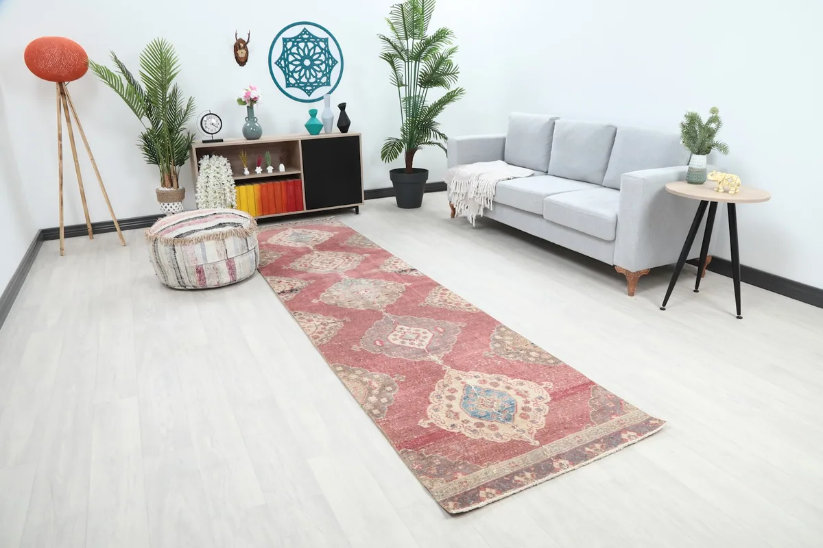 Angle view of the rose runner rug in a room setting, highlighting its colors and design