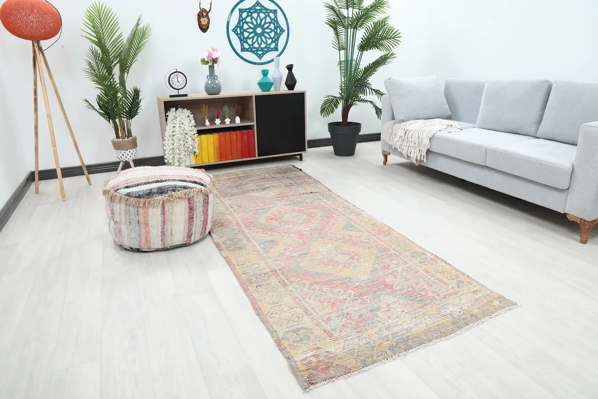 Angle view of the runner rug in a living space, showing its length and colors