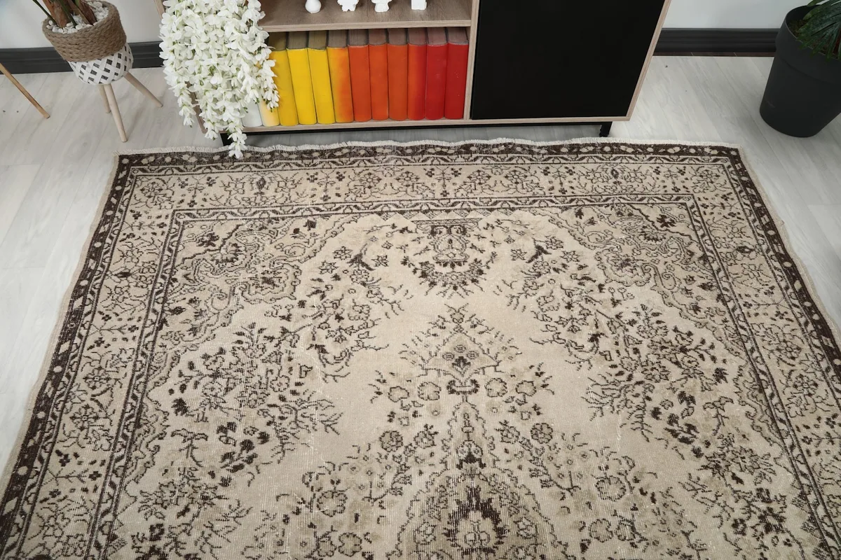 Overhead view of the rug's top half, showing the medallion and field patterns