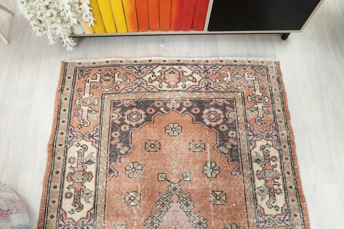 Top-down view of the upper half of the rug, highlighting the field and border