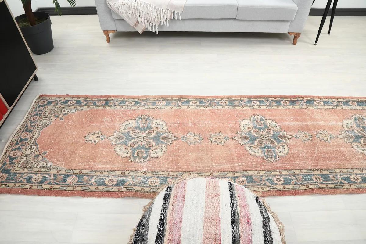 Wide angle view of the runner rug in a room, showing its length and how it complements the decor.