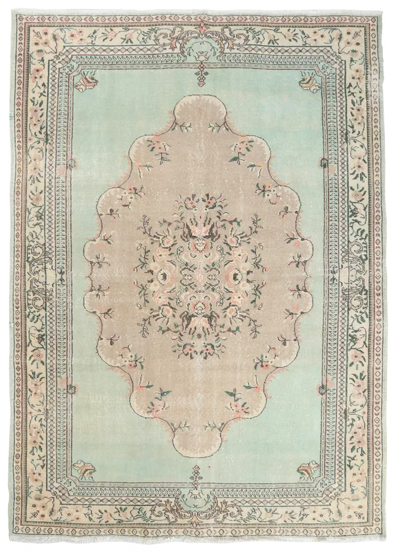 Faded Green Floral Medallion Rug, full top view showing the central medallion and borders.