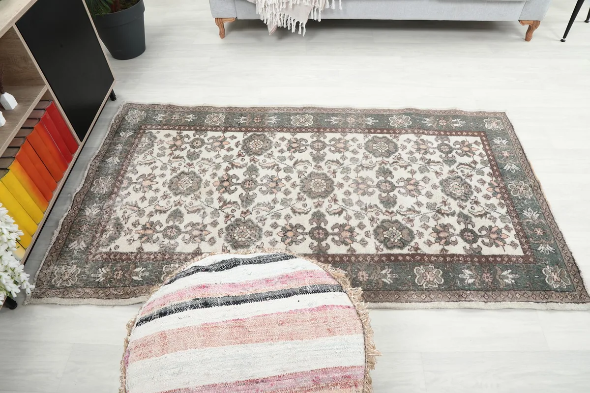 Full view of the rug placed in a room, showing its scale relative to furniture