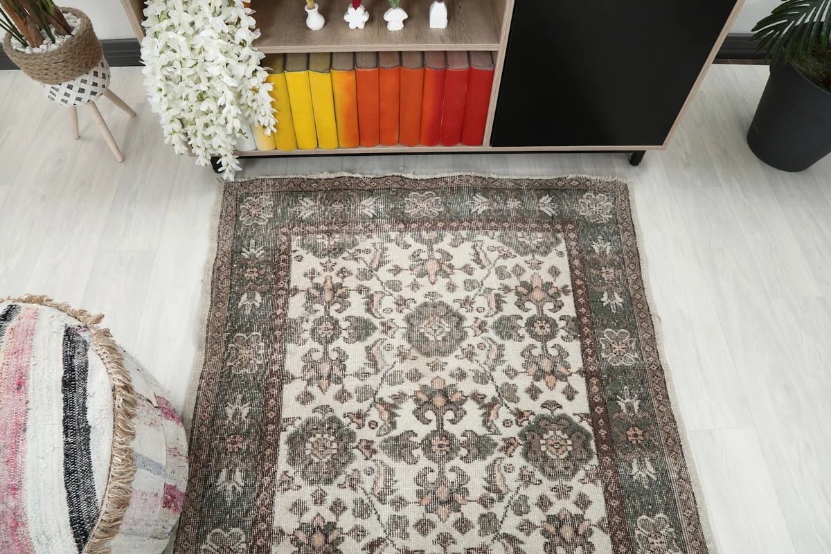 Overhead shot of the rug in a room, capturing its full length and pattern