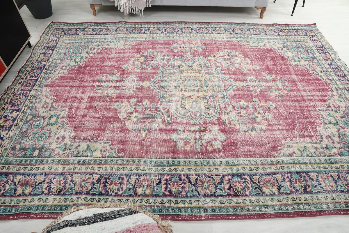 Full room view of the rug, emphasizing its decorative impact and color palette