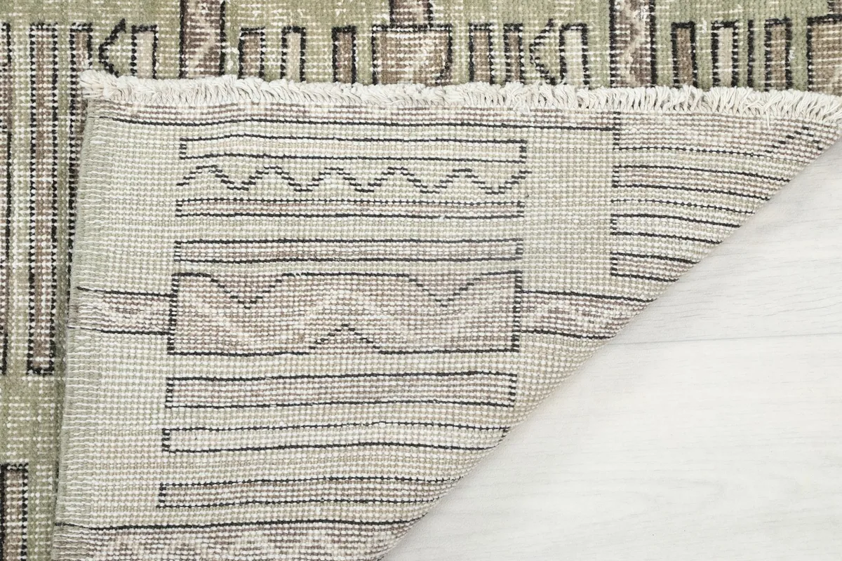 Close-up of the back of the rug, revealing the tight hand-knotting