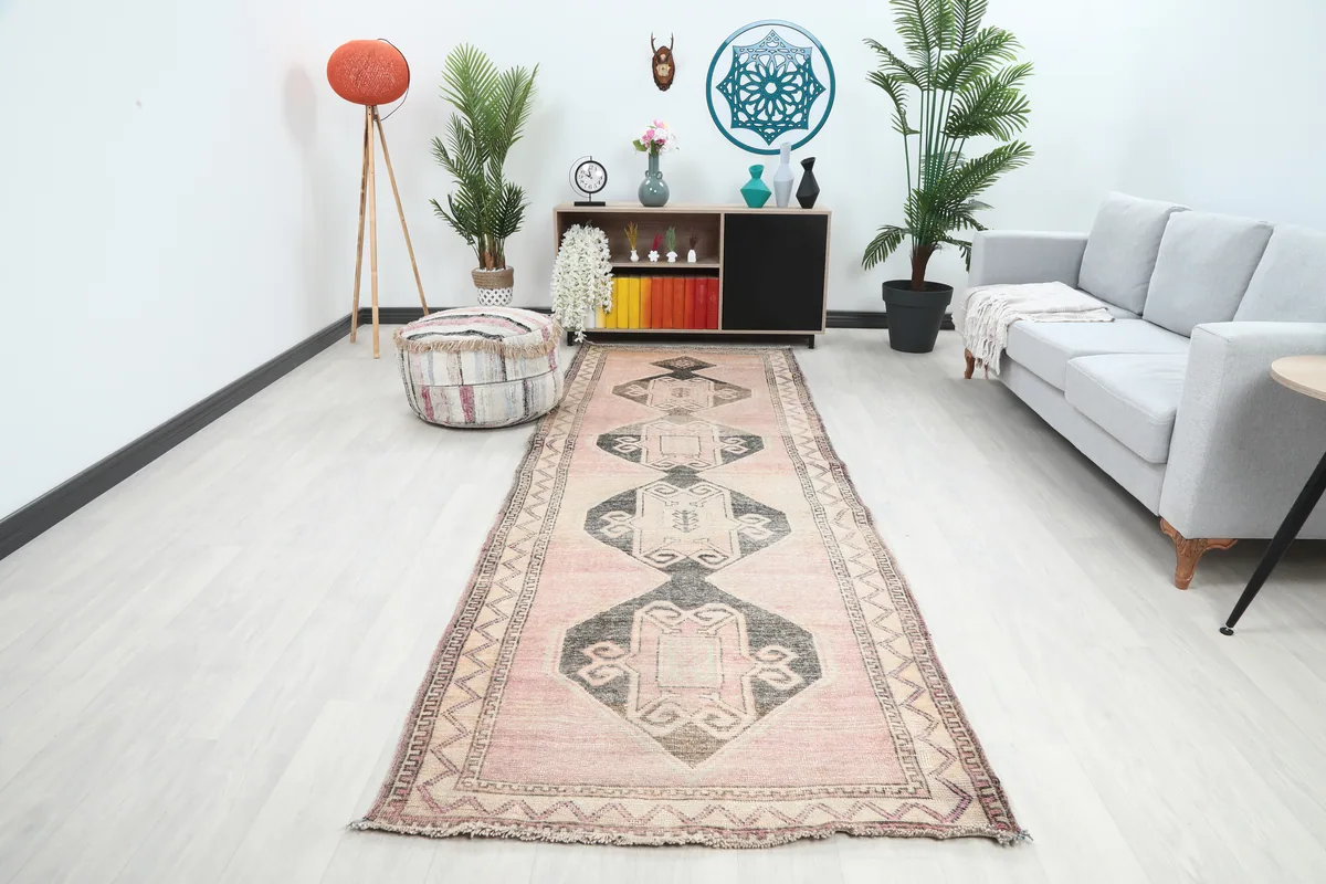 Faded Rose Diamond Tribal Runner in a modern living room setting