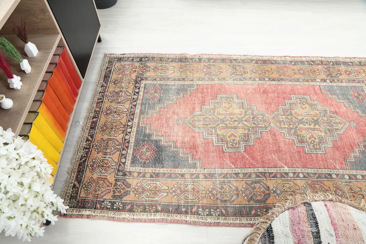 Wide-angle view of the rug's design and colors from above