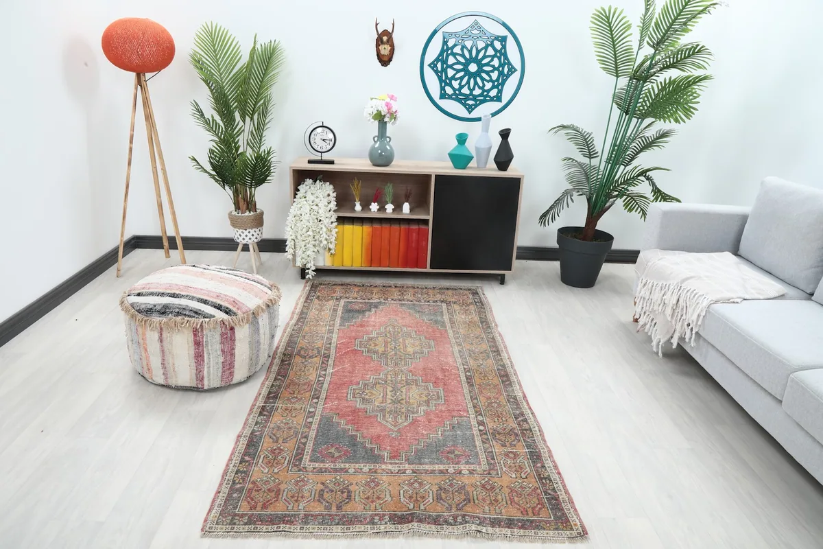 Rose geometric rug placed in a modern living room setting