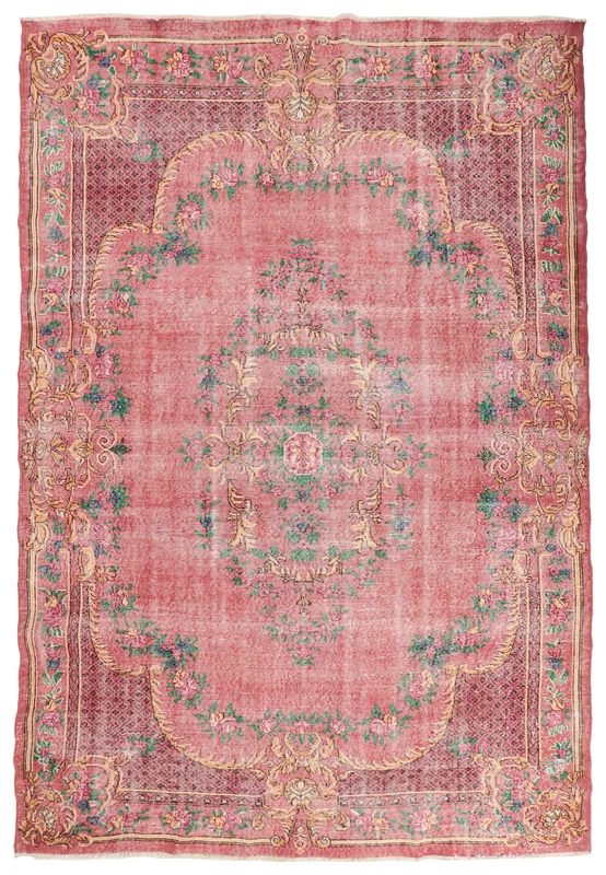 Top view of the 7x11 vintage rose floral medallion rug on a white background