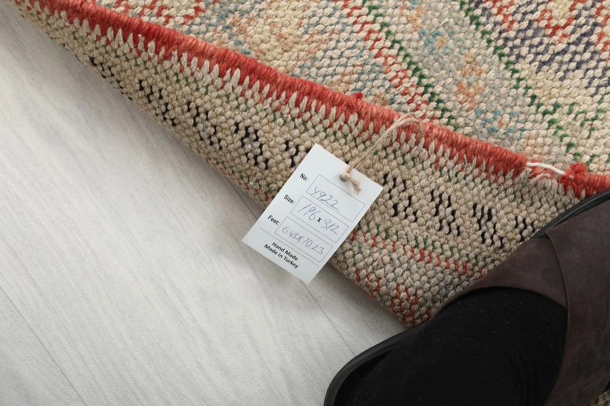 Close-up of the rug's label, indicating its origin from Anatolia, Turkey.