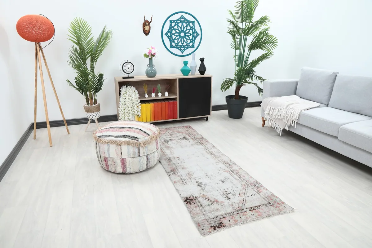 Vintage runner rug in a modern living room setting, viewed from an angle