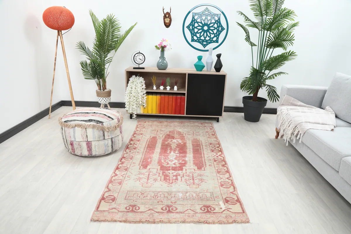 Faded Rose Geometric Anatolian Rug in a living room setting, showcasing its 4x6 size and overall appearance.