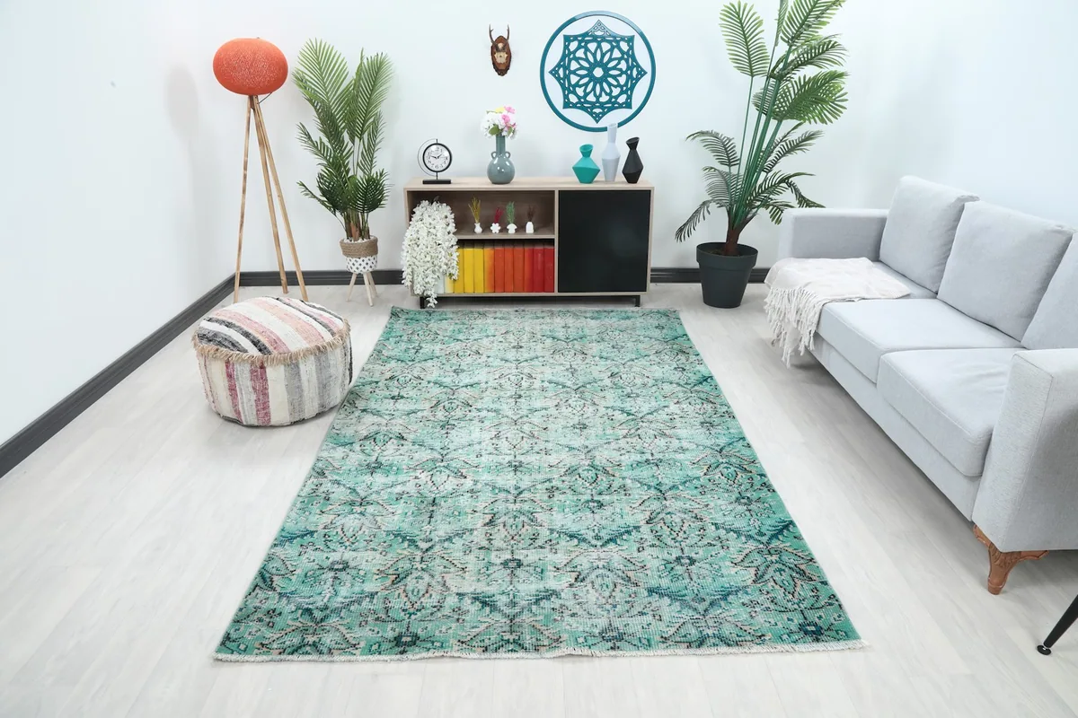 Vintage Anatolian rug displayed in a modern living room setting