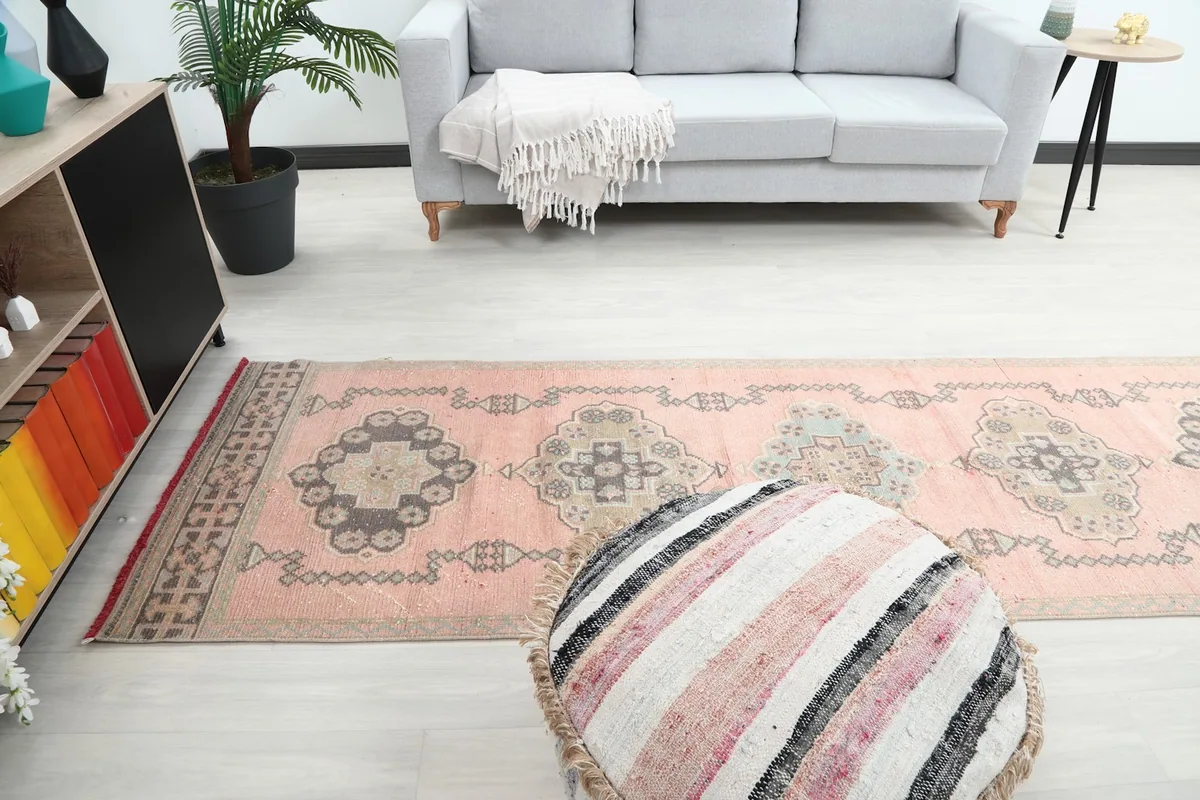 Another wide shot of the rose runner rug, showing its presence in the living area.