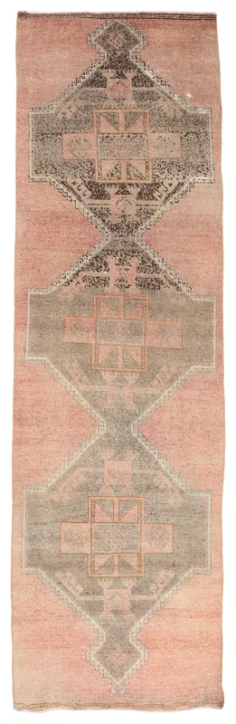 Full overhead view of the rose and gray Anatolian geometric runner