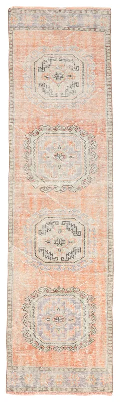 Full top view of the 2'9" x 10'9" orange geometric vintage Anatolian runner