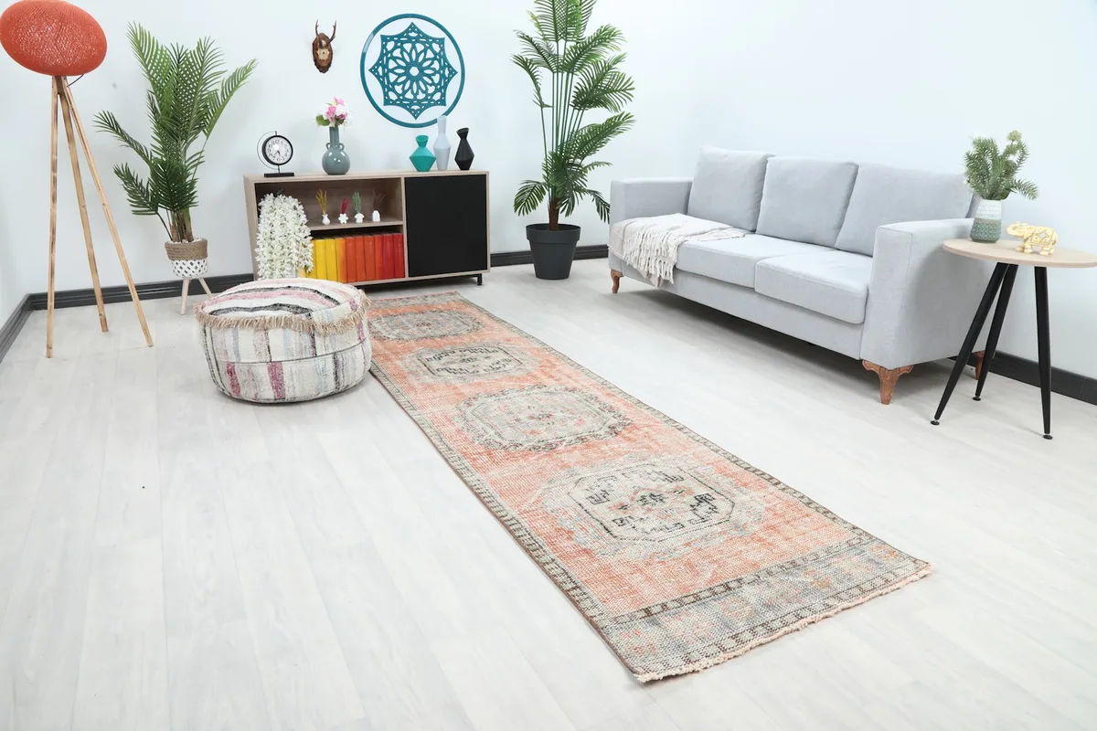 Anatolian runner in a living space, showing its length and color next to furniture