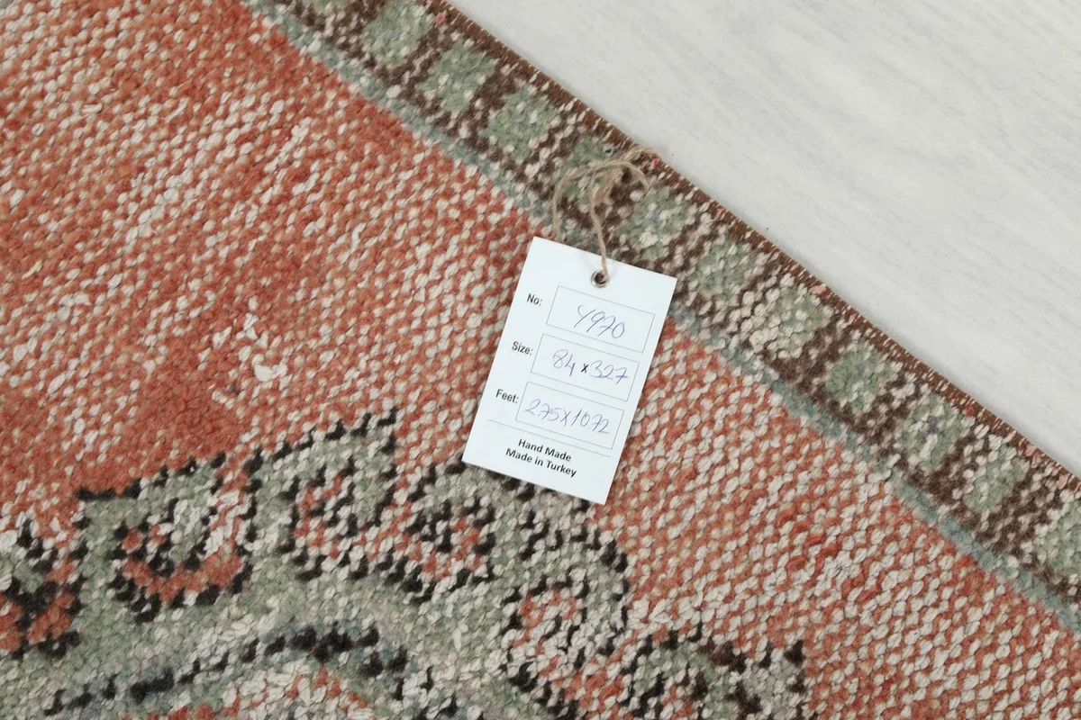 Product tag on the rug showing size and origin details