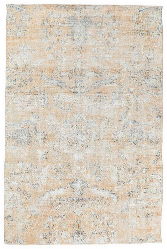 Full top view of the 6'0" x 9'1" vintage Anatolian rug with beige field and faded blue patterns