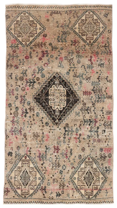 Full top view of the beige tribal geometric medallion vintage Anatolian wool rug