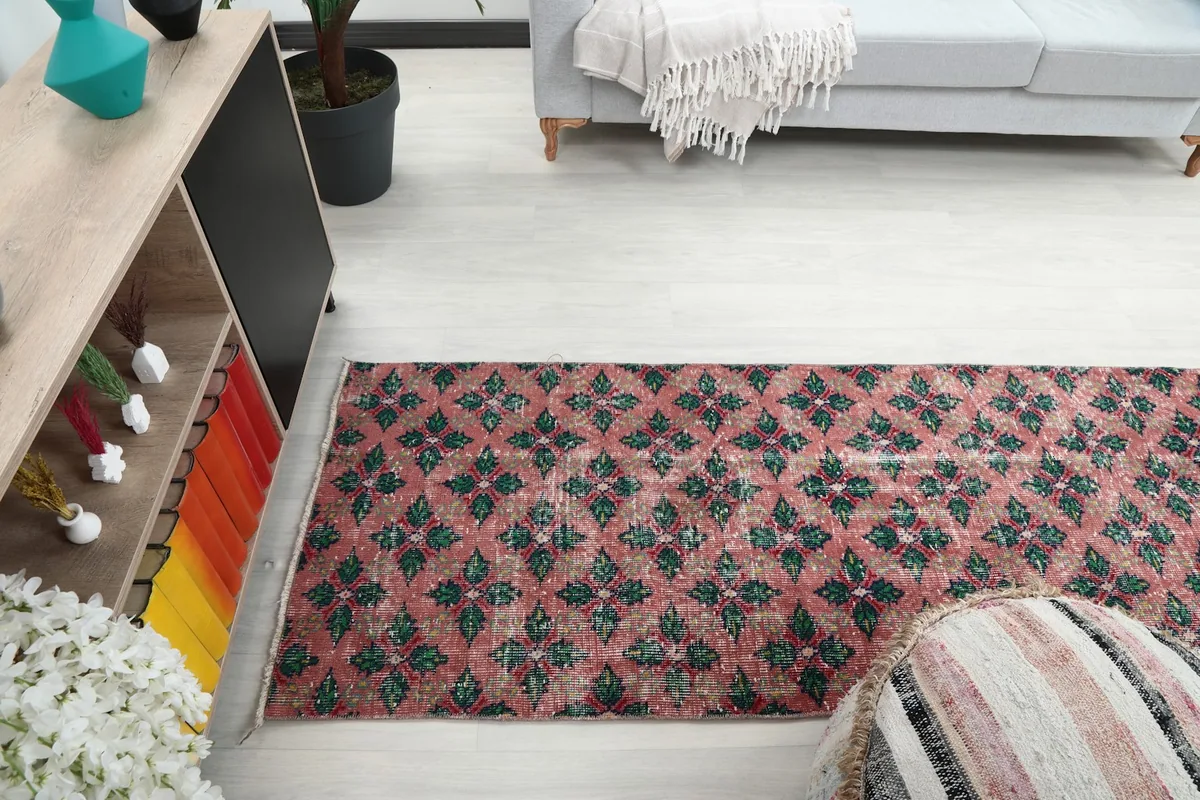 Partial room view showing the runner rug extending into the space