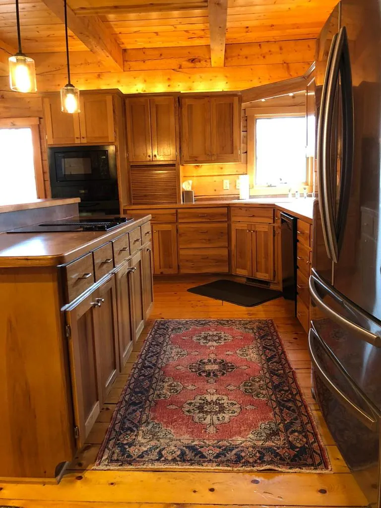 Red medallion vintage runner in a wooden kitchen